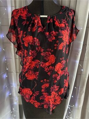 BCX red and black floral ruffle blouse rhinestone accent open sides Sz M